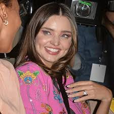 Miranda Kerr Flashes Wedding Ring at Moschino Fashion Show