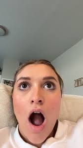 Girl Reacting to Travis Kelcis Gift to Taylor Swift