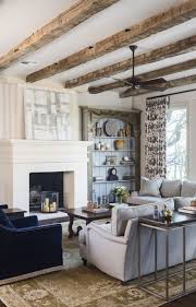 After i completed this project i realized i had to pull down the plaster ceiling to reveal the wood beams in the other lower level rooms. Reclaimed Hand Hewn Wood Beams Beams Living Room Ceiling Beams Living Room Farm House Living Room