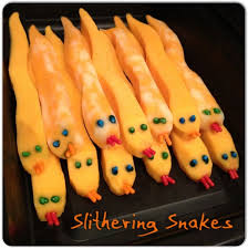 Slithering Snakes Made From Cheese Sticks For A Healthy Halloween Snack Healthy Halloween Snacks Healthy Halloween Halloween Snacks