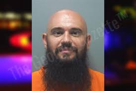 Michael Smith : https://thegeorgiagazette.com/cherokee/michael-smith-305/