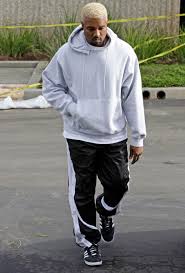 This classic kanye west hoodie features an image of the guy on a bright red hoodie. The Kanye West Look Book Gq