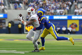 Trey McBride catches a pass during the Cardinals vs Broncos game