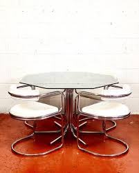 Chrome tables and chairs in fairly good condition can be cleaned using a simple cheesecloth dipped in a mild detergent, like liquid dish soap. Octagonal Smoked Glass Chrome And Leatherette Dining Table Chairs Set 1970s Set Of 6 For Sale At Pamono