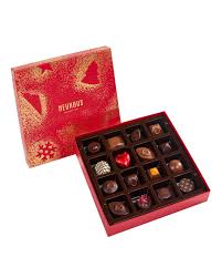 Neuhaus, the creator of the famous belgian praline in 1912 and the equally famous belgian ballotin gift box in 1915, is passionate about creating and extended range of exquisite chocolates to both the eye and the palate. Neuhaus Chocolate 16 Piece Holiday Gift Box Holiday Gift Box Christmas Chocolate Corporate Holiday Gifts