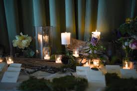 Welcome Table Arrangements And Decor Featuring Mix Of Candles Bud Vases Moss And Raised Branch Decor Battery G Branch Decor Table Arrangements Welcome Table