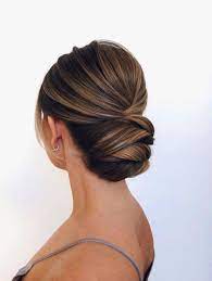 There's the low bun, the chignon, options full of volume, and options featuring waves. 60 Trendiest Updos For Medium Length Hair Classic Updo Hairstyles Classic Updo Bridal Hair Updo