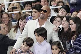 Dwayne johnson is known around the world as a hollywood movie star. Dwayne The Rock Johnson Takes Kids On New Film Journey Reuters