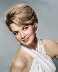 Angie Dickinson, retired actress, early 1960s. She had "... her  breakthrough role in Gun the Man Down (1956) with James Arness and the  Western film Rio Bravo (1959) with John Wayne and