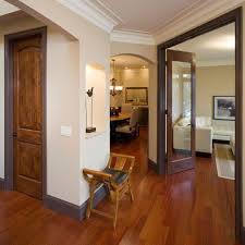 White Crown Molding Stained Door Frames And Baseboard Lighter Wood Floor And Doors Stained Wood Trim White Baseboards Stained Trim
