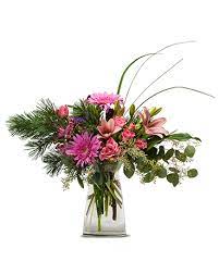 Modern bouquets & unique plants designed to impress. Holiday Spirit Flower Arrangement Flower Delivery Fresh Flowers Arrangements Flowers Delivered