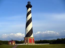 The national park service reports the height as 210 feet to the top of the lightning rod. The Cape Hatteras Lighthouse With Its Black And White Candy Cane Stripes Is One Of The Most F Hatteras Lighthouse Cape Hatteras Lighthouse Famous Lighthouses