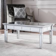 This mirrored coffee table features a distressed wood base with a glass top set inside an angular frame. House Of Hampton Walsall Mirrored Coffee Table Reviews Wayfair