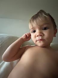 I love finding pictures like this. Our second oldest was hanging out with  our youngest and taking some fun pictures.