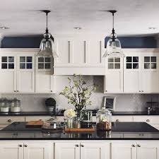 Dream Kitchen Inspo Via Meadowlark Park Featuring Our Rustic Glass Pendants P S Buy More Black Kitchen Countertops Kitchen Cabinets Decor Kitchen Renovation