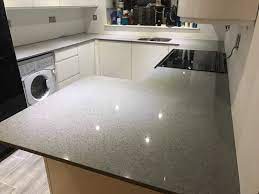 Quartz worktops, like their granite cousins, give a refined and polished look to any new kitchen. Grigio Chiaro Stella Quartz Worktops Rock And Co Granite Ltd