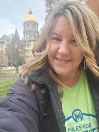 Mom was honored today to get to walk out during the Pink Out pep rally. She  was escorted by Kolt and Kyler (Koop was home not feeling well😢) this was  such a