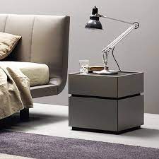 A modern bedside table is essential for maintaining convenience and keeping your loose necessities close without having to get out of bed to turn on the light, grab your book, turn off your buzzing alarm, or reach for your ringing phone. Como Designer Bedside Table Gloss Or Matt