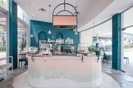 This Retro Chic Haven Of A Dessert Bar Is Not Only For Those With A Sweet Tooth It Is Eye Cand Retail Interior Design Bar Interior Design Cafe Interior Design