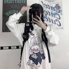 Purchase a pair of suspenders at a local clothing store, strap them onto . Buy 1 Nerdy Grunge Anme Girl Long Sleeve