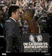 Boxers Oscar De La Hoya, left, and Floyd Mayweather face off during a news  conference at City Hall in San Francisco, Tuesday, Feb. 27, 2007. The news  conference was one of an