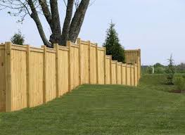If the edge of your property is near a creek or a slope, they can recommend the best procedures for keeping your fence straight. Free Standing Patio Fence Ideas Hunker Diyfenceart Fence Design Wood Fence Design Sloped Yard