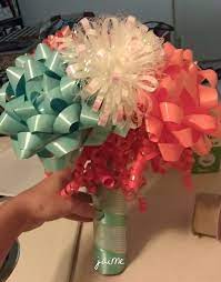 I wanted to find a different way to bunch together ribbons and bows from a bridal shower, and this happened! Bridal Shower Invitation Ideas Bridal Shower Bridal Shower Gifts Bow Bouquet