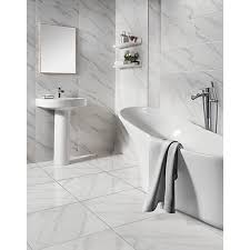 This is also an interesting approach. Wickes Calacatta Gloss White Marble Effect Glazed Porcelain Wall Floor Tile 605 X 605mm Wickes Co Uk