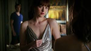 She is the primary love interest of christian grey, with whom she finds true love. The Dress Pink Gold Anastasia Steele Dakota Johnson In Fifty Shades Lighter Spotern