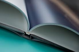 Are they a blast from the past? Book Bound Hard Cover Professional Coffee Table Photo Book With Frosted Plastic Case Asukabook