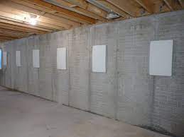 Countersunk staples and epoxy injection were used to repair this cracked basement wall. Foundation Wall Anchor Covers In Lexington Covington Fort Mitchell Bowing Wall Repair In Kentucky