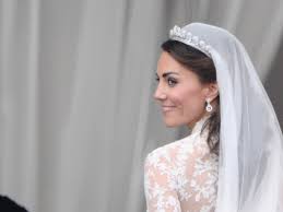 The duchess chose a white strapless satin gown with detailing around the waist for the evening wedding. A Decade On All The Details You Missed In Duchess Of Cambridge S Unforgettable Wedding Dress British Vogue
