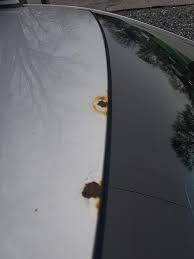 Rust spots on a car door are unsightly and diminish the value of the car. Help With Fixing My Roof New To Car Repair And Detailing How Would I Fix These Rust Spots Cartalk