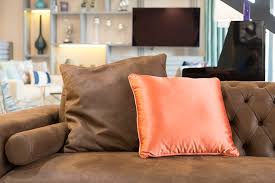 The color brown, associated with the ground, earth and nature, exudes a sense of roots and home. How To Choose Throw Pillows For Your Brown Couch Homenish