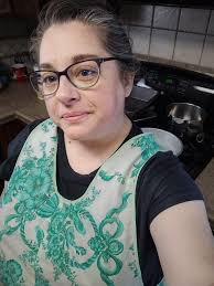 Vintage aprons with floral patterns and ruffles