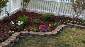 The stream ends in a small corner pool in a rush of water. Corner Landscaping Corner Landscaping Garden Layout Corner Garden