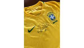 Ronaldo has signed the shirt on the back, making it a unique item. Ronaldo Nazario 2016 Signed Store Shirt Charitystars