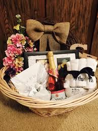 Whether you are giving a basket filled with gifts for a baby or bridal shower, a housewarming gift or one for a birthday party, your friends will love it. Bridal Shower Gift Basket Diy Diy Wreath Photo Champagne Champagne Glasses Bowls Mr Diy Bridal Shower Gifts Bridal Shower Baskets Bridal Shower Gift Baskets