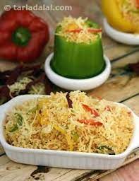 Cheesy Pepper Rice Jain International Recipe Recipe Jain Recipes Indian Food Recipes Vegetarian Stuffed Peppers