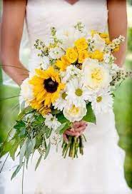 Wedding themes wedding blog wedding colors wedding flowers wedding decorations wedding ideas wedding yellow wedding venues sunflower wedding theme. Summer Wedding Bouquet Idea Rustic White Yellow Bouquet With Sunflowers Daisie Sunflower Wedding Bouquet Cascading Bridal Bouquets Summer Wedding Bouquets