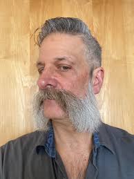 Much as I love length and bushyness I decided this is a style that requires  shape and refinment, so I tappered and defined my Franz Joseph look. What  do you think guys? :