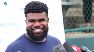 Cowboys RB Ezekiel Elliott talks at his camp