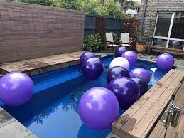 Maybe you would like to learn more about one of these? Floating But Weighted 90cm Purple Balloons In A Pool Magic In The Middle