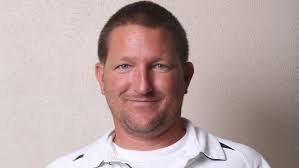 Former high school swim coach accused of touching girl's butt