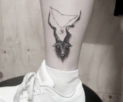Goat tattoo on the ankle. 20 Stunning Goat Tattoos And Their Meanings Nexttattoos