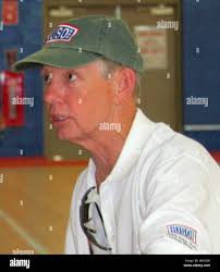 South Carolina coach Dave Odom, left, waves to the crowd as he is joined by  his family during a special honors before his last home basketball game  against Kentucky Wednesday, March 5,