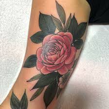 Designed on the leg, this rose tattoo takes on a brilliant blue color. 48 Beautiful Rose Tattoo Ideas For Women Revelist