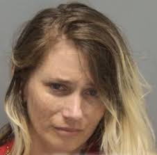 A mother allegedly recorded a video of herself abusing her "demonized"  child and sent it to friend accompanied by a message that said she wanted  to kill her husband with her "bare