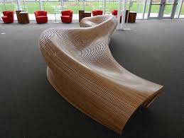 amada is a striking sculptural bench with a fluid shape that appears to be flowing through space it is the work contemporary bench furniture design furniture