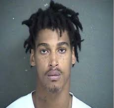 Man arrested in 3 Lawrence robberies, including one in which dog was killed